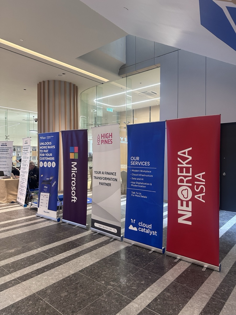 IA Business Summit 2026 supporter banners including NEOREKA ASIA, Cloud Catalyst, High Pines, Microsoft, and Fiuu